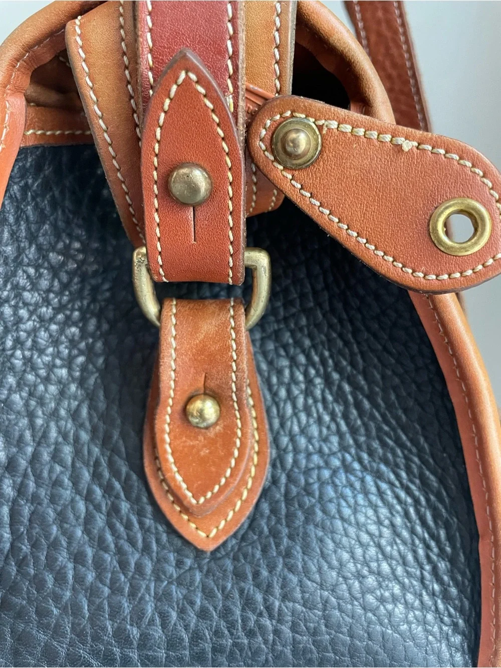 Dooney & Bourke Vintage All Weather Leather Handbag Black Tan Duck Logo AWL